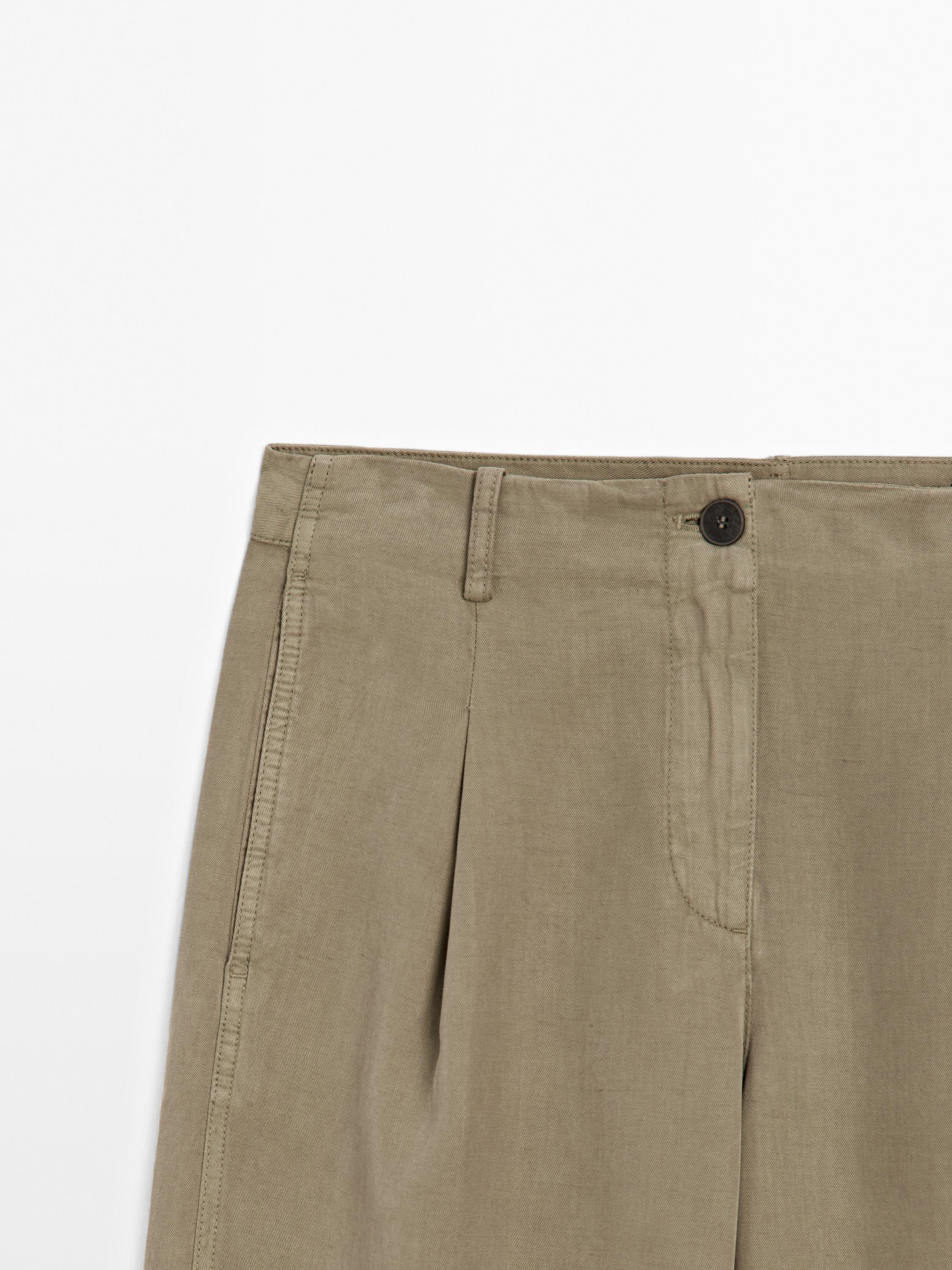 Flowing barrel fit trousers with seam detail